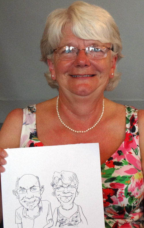 photo of birthday guest with caricature drawing, stratford-upon-avon,